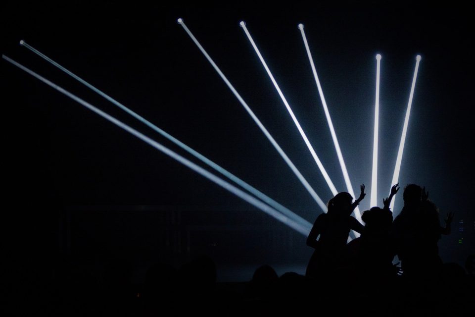 Strobe lights with people dancing