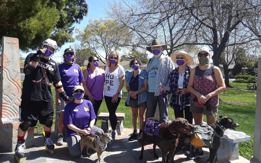 Eric's Corner Epilepsy Awareness group wearing purple outside